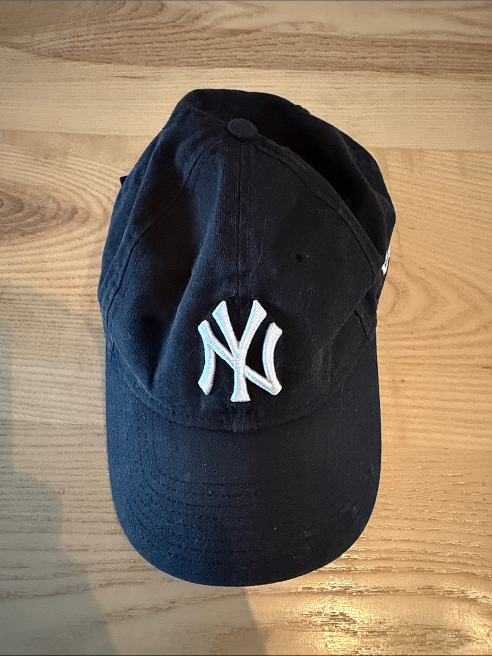New Era Black Baseball Hat with White NY Logo